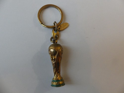 Porte clé metal dore - porte,