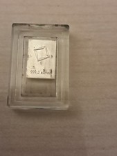 Lingotin d'argent de 1 gr dans son conteneur transparent.
