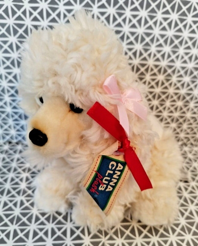 Peluche doudou chien caniche