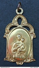 Belle médaille religieuse fin XIXe doré "Saint Joseph et l'Enfant Jésus"