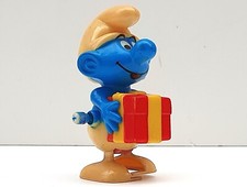 PEYO SCHTROUMPF PORTANT UN PAQUET CADEAU JOUET MÉCANIQUE ANCIEN FONCTIONNE VIDEO