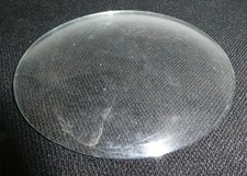 Verre ancien ovale et concave