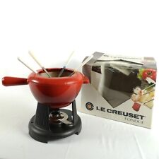 Service à fondue en fonte