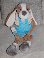 Doudou peluche chien beige salopette bleu NOUNOURS