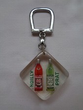 ANCIEN PORTE CLE BOURBON MOBILE A BULLE APERITIF NOILLY PRAT