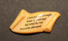 Fève "Proverbe allemand: l'amour rend aveugle mais ..."