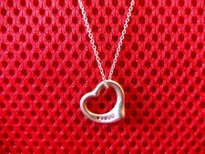 Collier avec pendentif Tiffany & Co Open Heart argent 925 et saphirs roses 