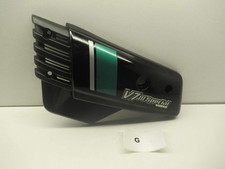 Cache latéral gauche (Moto