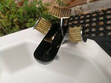 lavabo et robinet Rolex salle de bains