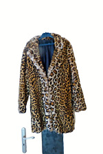 Manteau fourrure synthétique impression panthère