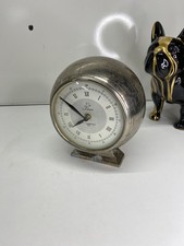 Horloge à poser sur table de chevet … décors terre sans pile pas tester