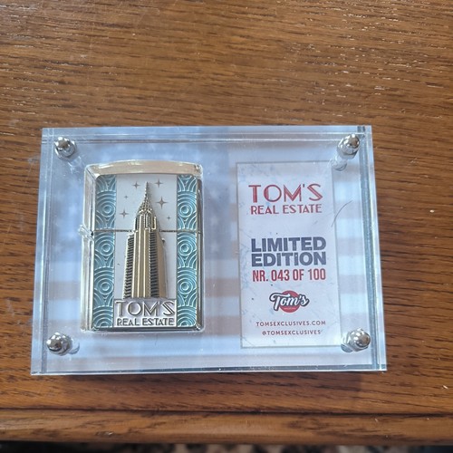 Zippo tom real estate - tom's,