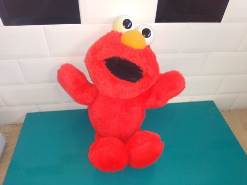 Peluche elmo chatouille moi - chatouille,