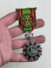 Croix de chevalier de l'ordre du Nicham Iftikar en argent, émaillée