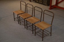 Ensemble de 4 chaises industrielles assise en chêne 1950's