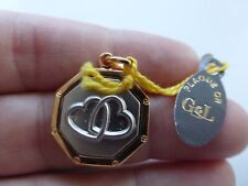 médaille coeurs enlacés