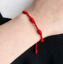 Bracelet kabbale talismanique 7 Noeuds rouge, fil tressé  contre le mauvais oeil