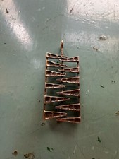 Pendentif en bronze Sarpaneva