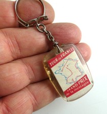 Ancien porte cle Tour de France Grand Prix de la Montagne Chocolat Poulain.