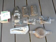 M5. 6 Anciens moules à chocolat de forme variée. Pipe, bûche, poule, père noël