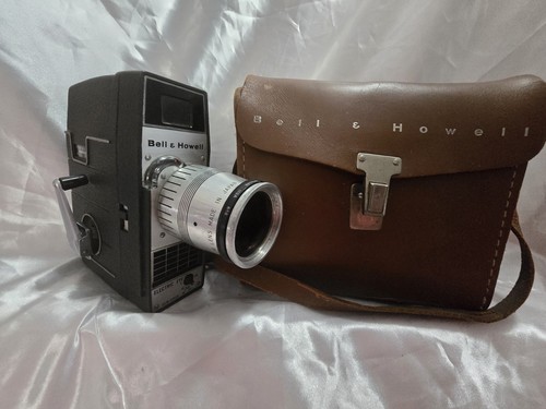 Bell howell electric - &,