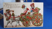 cpa illustrateur gaufree  voiture aux chevres  fleurs attelage 
