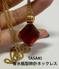 Collier pendentif montre perle