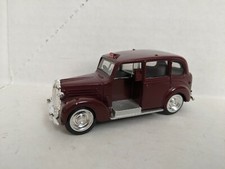 Vintage 1/43 Ertl FX3 London