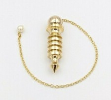 PENDULE EN LAITON OSIRIS