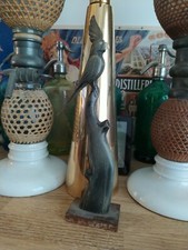 Corne sculptée représentant un perroquet 
