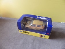 1/43    BURAGO RENAULT CLIO COUPE  DANS  SON EMBALLAGE D ORIGINE