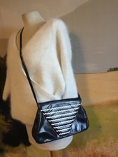 Sac cuir Vintage CHARLES JOURDAN noir/blanc en très bon état.