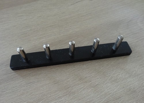 Pièce support canette elna - support,