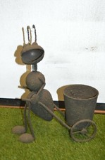 jardinière / fourmis avec un cache pot en fer 