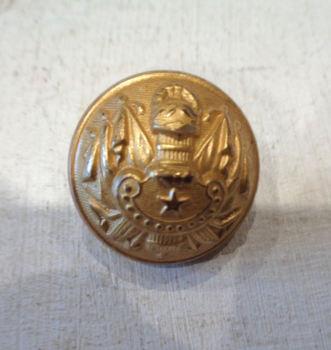 Bouton pour une tenue - , de