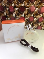 miniature de parfum ** eau des merveilles ** hermes **7,5ml.