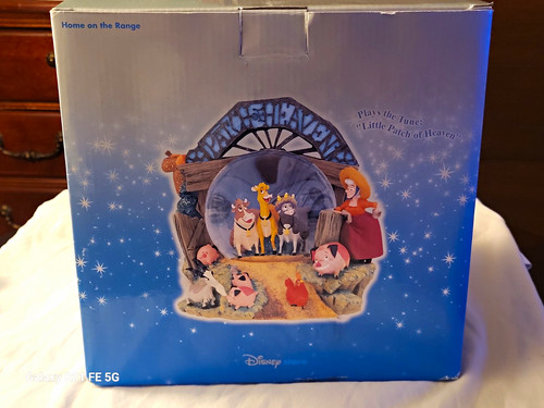 Disney store magical snowglobe - disney,