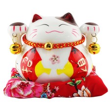 Tirelire chat chanceux signe