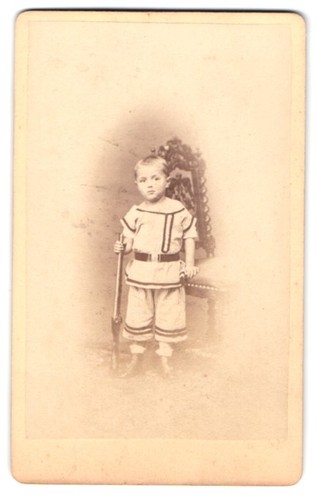 Photographie enfant avec fusil