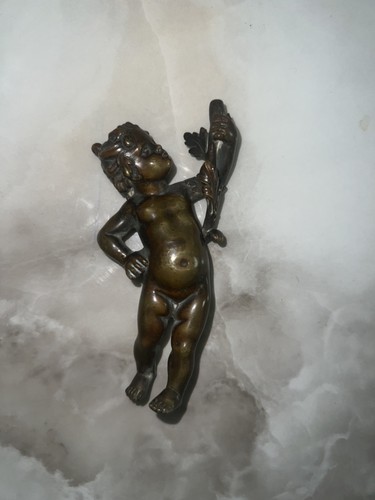 Cupidon putto en - /,