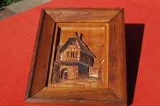 Sculpture sur bois Signé