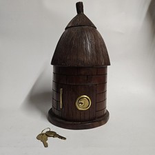 Tirelire en bois en forme de