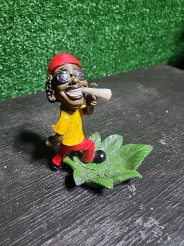 Rasta jamaican man holding - rasta,