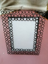 Cadre photo cercles en bronze fini cuivre. Commerce équitable, fait main. En boite avec info