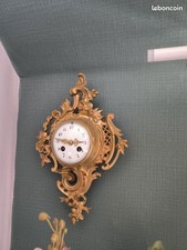 Pendule mural, cartel d'applique, en bronze doré