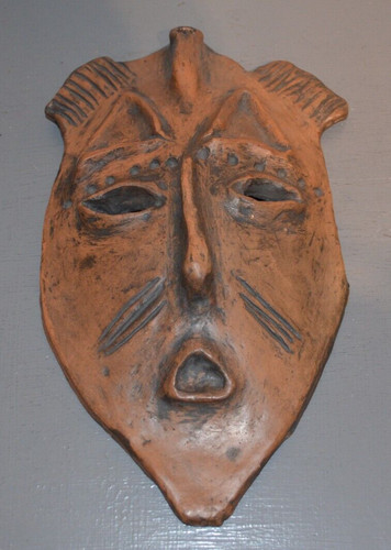 Masque mural terre cuite - , en