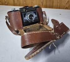 Appareil photo argentique ULTRA FEX avec son étui en cuir  marron