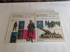  l'uniforme et les armes des