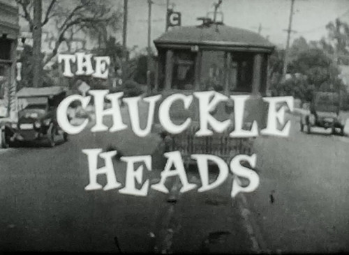 8mm film chuckle heads - 8mm, bw