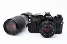 2 objectifs [Exc+5] Canon AE-1 Program Noir 35mm Reflex Nouvel objectif FD...